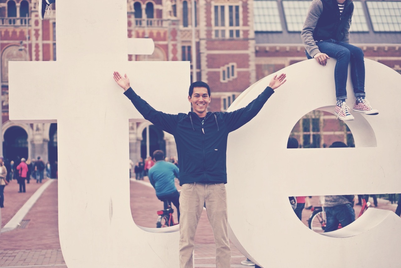 Tye in front of Amsterdam letters